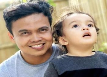 Zulfirmansyah dan putranya. Foto: Detik