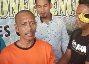 TERSANGKA kasus penistaan agama dan makar, Hamdani di Mapolres Garut, Selasa (18/6/2019). Foto: Kabar Priangan