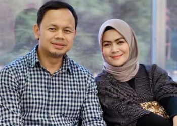 Wali Kota Bogor dan istri. Foto: Tribun