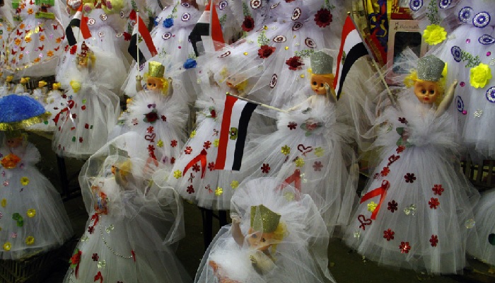 tradisi maulid nabi di mesir boneka permen